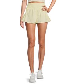 From Free People FP Movement, these shorts feature:High rise smocked waistbandSide pocketsPull-on constructionApprox. 1.12" inseamPolyesterMachine wash/tumble dryImported. Free People Shorts, Romantic Lace, Lace Insert, Fp Movement, High Rise Shorts, Dillard's, Running Shorts, How To Feel Beautiful, Light Yellow