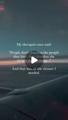 an airplane wing with the words,'my therapy once said people don't abandon the people they love, either brandon the people are sing and that was all the