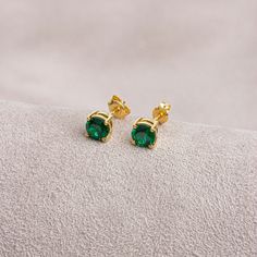 Emerald is known as the stone of love and loyalty. Emerald contributes to the development of emotional bonds.  Our 14K solid gold and round cut emerald earring is suitable for daily use with its special design and is a stylish jewelery that you can use on your special days and gift it to your loved ones. A stylish jewel for you and your loved ones. Time to pamper yourself and your loved ones... Emerald is the birthstone for those born in May. 🤍🤍 Special gifts for your special moments. We produ Green Prong Set Earrings As Gift, Green Prong Setting Earrings For Gift, Classic May Birthstone Jewelry, Tarnish Resistant, Green Earrings With Prong Setting As Gift, Classic May Birthstone Jewelry Tarnish Resistant, Classic May Birthstone Jewelry, Fine Jewelry Gemstone Earrings For Gift, May Birthstone Earrings With Prong Setting In Round Cut, Fine Jewelry Earrings For May Birthstone