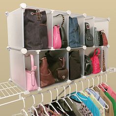 a rack with multiple bags and purses on it