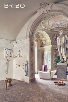 the front cover of brizz magazine featuring a statue and bathtub in an ornate bathroom