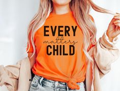 Support Indigenous awareness with our Every Child Matters shirt, designed to honor Orange Shirt Day 2024 and promote Truth and Reconciliation. A portion of every purchase of tgis September 30th Tshirt goes directly to Indigenous First Nations causes, making this tee not just a statement, but a contribution.   Please review all photos for respective size charts. How to Order: 1. Review all photos. 2. Choose your size from the drop-down menu. 3.Add to cart and repeat for additional items. PROCESSI Cotton Graphic Print Shirt For Awareness Events, Cotton Shirt With Graphic Print For Awareness Events, Pre-shrunk Graphic Tee For Awareness Events, Cotton Tops With Letter Print For Awareness Events, Casual Crew Neck Shirt For Awareness Events, Casual Cotton Shirt For Awareness Events, Truth And Reconciliation, Orange Shirt Day, Every Child Matters