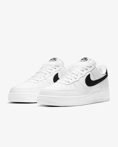 The radiance lives on in the Nike Air Force 1 '07, the b-ball icon that puts a fresh spin on what you know best: crisp leather, bold colours and the perfect amount of flash to make you shine. White Nike Shoes, Baskets Nike, Nike Air Force 1 07, Mens Nike Air, Air Force 1 Low, Nike Sneakers