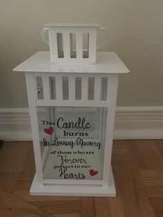 a white candle holder with words and hearts on it