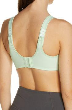 A soft and supportive sports bra is fashioned with wide shoulder straps and a powerful exterior underwire for an exceptionally secure and comfortable fit. Moisture-wicking fabric keeps skin cool and dry. Convertible straps can also be worn crossed in back. Lined. 80% nylon, 20% spandex. Hand wash, line dry. By Wacoal; imported. Lingerie. Nylon Sports Bra With Adjustable Straps And 4-way Stretch, Functional 4-way Stretch Sports Bra With Adjustable Straps, Functional Sports Bra With Adjustable Straps And 4-way Stretch, Supportive Nylon Racerback Sports Bra, Nylon Sports Bra With Adjustable Straps For Workout, Medium Support Nylon Activewear With Adjustable Straps, Supportive Nylon Activewear With Adjustable Straps, Green Activewear With Adjustable Straps For Sports, Supportive Nylon Sports Bra Sleeveless