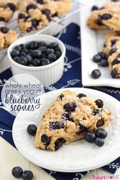 blueberry scones are stacked on plates and ready to be eaten