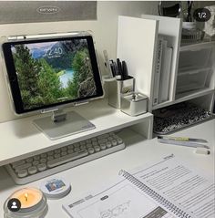 an apple computer sitting on top of a desk