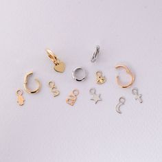 14K 18K Solid Gold Small Tiny Charms, Dainty Everyday Gold Figures For Hoop Earrings, Custom Handmade Charms, Cute Gift For Her We can add these charms to our hoop earrings model your purchased from us. Material: Solid Gold (not gold filled or gold plated) Karat: 14 K (585) 18 K (750) Available gold color: Yellow, rose and white gold M o r e * F r o m * U s Goldstore Jewelry - https://etsy.me/3gHtcrZ * Urn Necklaces - https://etsy.me/2Asb4BM * Bar Necklaces - https://etsy.me/2MhoVxO * Name Neckl Personalized Everyday Hoop Jewelry, Dainty Hoop Jewelry With Dangling Charms, Silver Tarnish Resistant Hoop Earrings For Jewelry Making, Small Hoop Jewelry With Dangling Charms For Gifts, Hypoallergenic Dangle Charms, Gold Earrings With Dangling Charms For Everyday, Hoop Charms For Jewelry Making, Everyday Yellow Gold Huggie Earrings With Charms, Dainty Charm Hoop Earrings As Gift