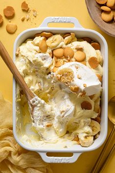 a bowl filled with ice cream and nuts