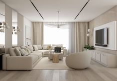 a modern living room with white furniture and wood flooring