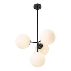 three light chandelier with white glass balls hanging from it's black frame