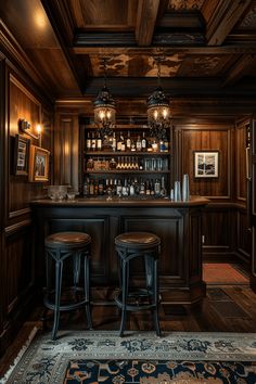 a bar with two stools in front of it and an area rug on the floor