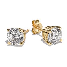 These classic stud earrings feature a pair of lab-grown diamonds set in warm 14-karat yellow gold and hand-matched for consistent color  clarity  and sparkle. Each pair of diamonds is unique and may vary slightly from the images shown. They also feature a la pousette back with a convenient locking mechanism  designed to keep your earrings secure while still being comfortable. Just squeeze the side tabs  slide it to your preferred notch on the earring post  and let go to lock it in place. Classic Gold Diamond Accent Earrings, Classic Gold Diamond Earrings With Accents, Gold Round Cut Lab Grown Diamond Earrings, Classic Yellow Gold Diamond Earrings With Prong Setting, Gold Lab Grown Diamond Round Cut Earrings, Gold Lab Grown Diamond Earrings Round Cut, Gold Lab-grown Diamond Round Cut Earrings, Classic Gold Moissanite Diamond Earrings, Gold Moissanite Diamond Earrings