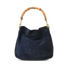 Gucci vintage bamboo handbag in navy blue suede and leather with a top push button closure in gold hardware. Features a single bamboo handle with a detachable shoulder strap, and grey canvas lining with an inner zip pocket. Brand = Gucci Condition = 8/10, Very good. Some wear in suede. c Dimensions = 11" x 9.75" x 3.5" Top Handle = 5" Strap Drop = 18" Material = Suede/Leather Hardware = Gold SKU = 20245-104 Bamboo Handbag, Navy Handbag, Gucci Vintage, Gucci Bamboo, Leather Hardware, Handbag Wallet, Scarf Jewelry, Wallet Accessories, Fall Style