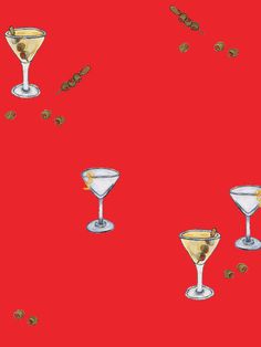 three martini glasses on a red background with coffee beans falling from the top and bottom