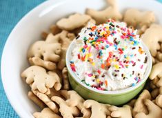 a bowl filled with cookies and whipped cream