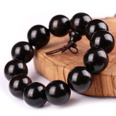 "Huge Stretchy Tibetan 12 20mm Black Sandalwood Yoga Meditation Buddhist Prayer Beads Wrist Mala Bracelet -6 1/2\" - As a beaded stretchy bracelet, it shall fit most hand! Huge stretchy Tibetan prayer beads wrist mala bracelet, with 12 top quality very big black sandalwood beads (include the Guru bead) threaded on the elastic band, for the total length around 6 1/2\" when un-stretched." Tibetan Prayer Beads, Buddhist Beads, Prayer Bead Bracelet, Tibetan Bracelet, Wrist Mala, Buddhist Prayer, Buddha Beads, Black Beaded Bracelets, Mala Bracelet