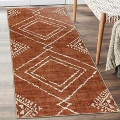 a brown and white rug in a living room