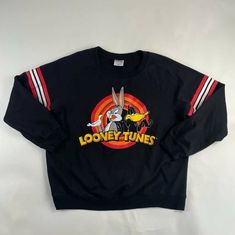 #10 PreOwned! Youth Size XL 15-17 Available!  All Used Cloths Are Professionally Washed! Measurements Shown In Pictures! Still Looks Great! Shipped Out Now!  Everything We Sell Is A 100% Authentic! All Items Come From A Smoke Free Home! Retro Black Fan Merchandise Sweatshirt, Retro Black Sweatshirt For Fan Merchandise, Looney Tunes Shirt, 17 Black, Looney Tunes, Looks Great, Long Sleeve Tshirt Men, My Style, Mens Tshirts