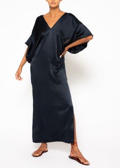 The Beatriz is a long 100% silk Kaftan dress features a V neckline, half kimono sleeves, and side slits along the hem. The Beatriz dress in navy is a striking option for the daytime or a night out.   Our pieces are majority made to order ensuring that no fabric is wasted and energy is conserved. Once the order is place Half Kimono, Long Navy Dress, Navy Long Dress, Silk Kaftan Dress, Kimono Sleeve Dress, Kaftan Designs, Lovely Fashion, Silk Kaftan, Kimono Sleeves