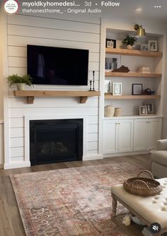 the living room is clean and ready to be used as a media center for movies