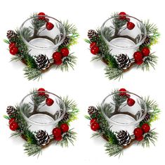 three glass dishes with pine cones and red berries on the rims, decorated with evergreen needles