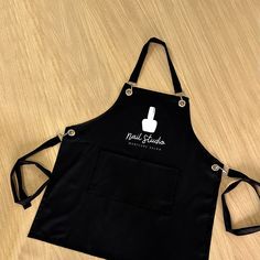 an apron that is sitting on top of a wooden table with the words natural foods written on it