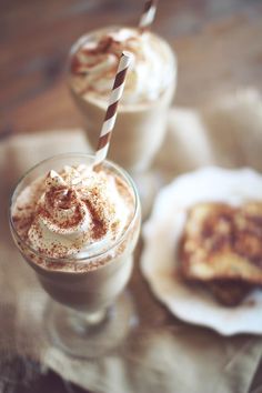 two desserts with whipped cream and cinnamon on top