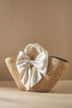 Straw, satin Bow styling Imported | Carlotta Tote by Eugenia Kim in Beige, Women's, Straw/Satin at Anthropologie Straw Purse Handbags, Spring Accessories 2024, White Straw Bag, Bride Bachelorette Outfit, Bridal Clutch Bag, Spring Handbags, Breezy Outfit, Rattan Material, Straw Purse