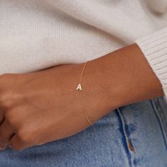 Exclusively ours, the Diamond Mini Uppercase Letter Bracelet is our newest addition to our letter collection! Handcrafted in 18-karat gold and set with shimmering pave diamonds, the mini initial is fixed on a delicate link chain. The perfect, personal gift for yourself, your mom, your BFF, or anyone on your list! 6.5" inch, 14-karat link chain Letter measures approximately 0.25" Lobster clasp Exclusively available on jennifermeyer.com or in our boutique! Made with love in Los Angeles Complimenta Bracelet With Letters Gold, Diamond Letter Bracelet, Minimalist Bracelet Gold, J Bracelet, Bracelet With Initials, Permanent Bracelet, Initials Bracelet, Letter Collection, Chain Letter