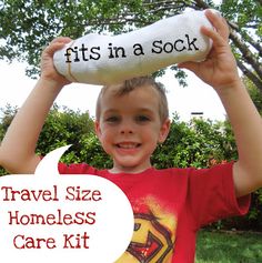 a young boy holding up a toy in front of his face with the words, travel sized homeless care kits