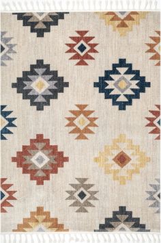 an old rug with many different colors and patterns