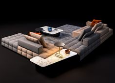 a living room filled with furniture on top of a black floor