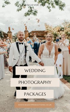 a bride and groom walking down the aisle with confetti flying in the air