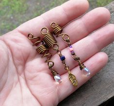 "- Made to Order, Set of 3 Handmade Items - Customized Items, You Choose Size, Wire Color - Tarnish Resistant or Enamel Coated Wire - 7-10 Business Days Processing Time - You Choose Shipping Method - Comes Gift Wrapped with Jewelry Care Card This listing is for a made to order set of three bohemian style dreadlock beads. They are made in the size and wire color of your choice and are accented with iridescent Czech glass teardrop beads, glass accent beads, and a brass leaf charm. Leaf charm color Jewelry Care Card, Bead Hair, Loc Hairstyles, Bead Hair Accessories, Dreadlock Beads, Loc Jewelry, Dread Beads, Hair Wraps