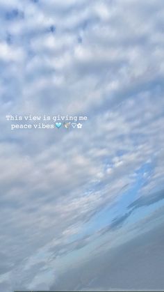 there is a kite flying in the sky with words above it that read, this view is driving me peace vibes love