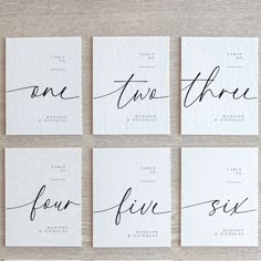 four different types of calligraphy on white paper