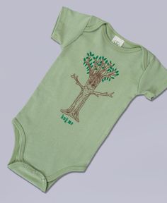 This hand-drawn tree seems to grow cuter every year, you can't help but want to give it a cuddle. Nature needs our care just as much as our babies, and both deserve one big hug!  Hug Me tree printed on an organic baby bodysuit. Three snap front closure. Made in the USA. 100% Organic cotton. Low-impact dyes. Soul Flower Original. Avocado.   Please note: These garments were dyed in small batches at different times. Coloring in these garments may vary. Hippie Nursery, Hippie Baby Clothes, Indie Baby, Hippie Baby, Baby Hospital, Big Hug, Nursery Baby Room, Organic Clothing, Big Hugs