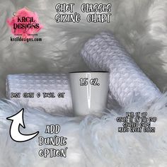 a white mug sitting on top of a fluffy blanket next to a roll of toilet paper