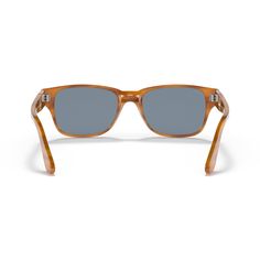 From the rich coloring to the masculine shape, Persol's 3288S delivers a classic summer accessory. The Italian-made sunglasses feature a sleek silhouette that combines a square acetate frame and varying shades of brown. Its warm Havana hue is paired with blue-tinted crystal lenses, while the temple is branded with Persol's signature arrow. The brand's trademark Meflecto system is hidden inside, delivering flexible comfort for all-day wear. Classic Square Frame Sunglasses For Summer, Classic Sunglasses With Tinted Lenses For Beach, Classic Tinted Sunglasses For Beach, Classic Wayfarer Sunglasses For Beach, Classic Brown Sunglasses For Summer, Classic Brown Square Frame Sunglasses, Classic Brown Sunglasses With Uv Protection, Classic Square Frame Sunglasses For Beach, Classic Square Frame Sunglasses With Polarized Lenses