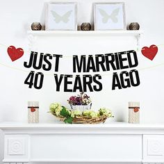 just married 40 years ago banner on mantle