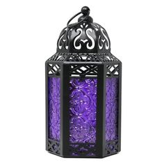 an intricately decorated purple lantern with the letter s on it's front and sides