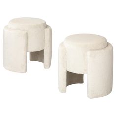 two white stools sitting next to each other