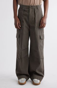 Tailored with a high waist and roomy legs, these pants crafted with soft cotton sport roomy pockets for essentials and a faded wash for an old-favorite feel. Zip fly with button closure Front bellows-patch pockets; back flap pockets; cargo flap-patch pockets 82% cotton, 18% polyester Hand wash, line dry Imported Designer Clothing Baker Pants Outfit, Wide Cargo Pants, High Waist Cargo Pants, Waist Cargo Pants, Bellows, Cargo Pants Men, Khaki Green, Cargo Pants, Designer Clothing