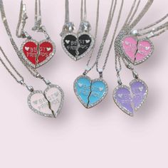 These adorable friendship necklaces come in two pieces, one for each bff. It is in the shape of a heart that is split in two, surrounded by sparkly rhinestones. When you put the two pieces together, they fit perfectly and make the heart whole. Available in 6 colors! Double Heart Charm Necklace For Friendship, Heart Pendant Charm Necklaces For Valentine's Day, Heart Pendant Charm Necklaces For Friendship And Valentine's Day, Heart-shaped Friendship Charm Necklaces, Double Heart Charm Necklace Valentine's Day Gift, Heart Charm Necklace For Friendship, Valentine's Day Heart Charm Necklace For Friendship, Silver Double Heart Necklace For Friendship, Pink Heart Necklace For Best Friend