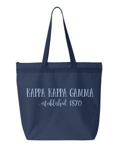 a blue tote bag with the words kapa kapa gama established 1970