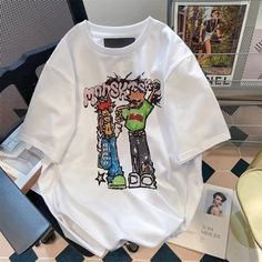 Women's Streetwear Skate Cartoon Short Sleeve T-Shirts Casual Crew Neck T-shirt With Graffiti Print, Y2k Crew Neck T-shirt With Character Print, Pop Culture Cotton T-shirt With Graphic Print, Y2k Relaxed Fit T-shirt With Funny Print, Oversized Y2k Tops With Cartoon Print, White T-shirt With Funny Print For Streetwear, Casual Crew Neck T-shirt With Character Print, Casual Crew Neck T-shirt With Cartoon Print, Summer Streetwear Tops With Character Print