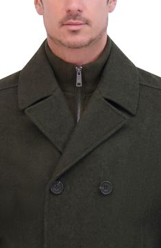 Add this classic wool peacoat to your wardrobe for an elevated style. Notched collar Long sleeves Button front Dual pockets 58% wool, 35% polyester, 4% acrylic, 3% other fibers Dry clean Imported Model stats: 6'1" height, 32" waist. Model is wearing size M. Solid Pea Coat With Button Closure For Fall, Winter Double-breasted Pea Coat With Hidden Buttons, Fall Pea Coat With Lapel Collar, Collared Pea Coat For Winter, Classic Green Outerwear With Double Button Closure, Classic Double-breasted Pea Coat For Fall, Classic Fall Pea Coat With Double-breasted Button, Winter Peacoat With Buttons And Lapel Collar, Classic Double-breasted Fall Pea Coat