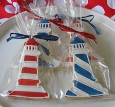 decorated cookies in the shape of lighthouses on a plate