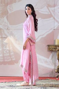 Pink kaftan high low kaftan kurta with mirror embroidery and tassel details. Paired with an inner and dhoti pant. - Aza Fashions Eid Cotton Silk Palazzo Set With Traditional Drape, Navratri Tissue Silk Palazzo Set With Traditional Drape, Unstitched Traditional Drape Kaftan For Weddings, Unstitched Wedding Kaftan With Traditional Drape, Tissue Silk Kurta With Mirror Work In Traditional Drape, Tissue Silk Palazzo Set With Traditional Drape For Eid, Traditional Drape Tissue Silk Kurta With Mirror Work, Bollywood Style Kaftan With Sheer Dupatta For Eid, Eid Tissue Silk Palazzo Set With Traditional Drape